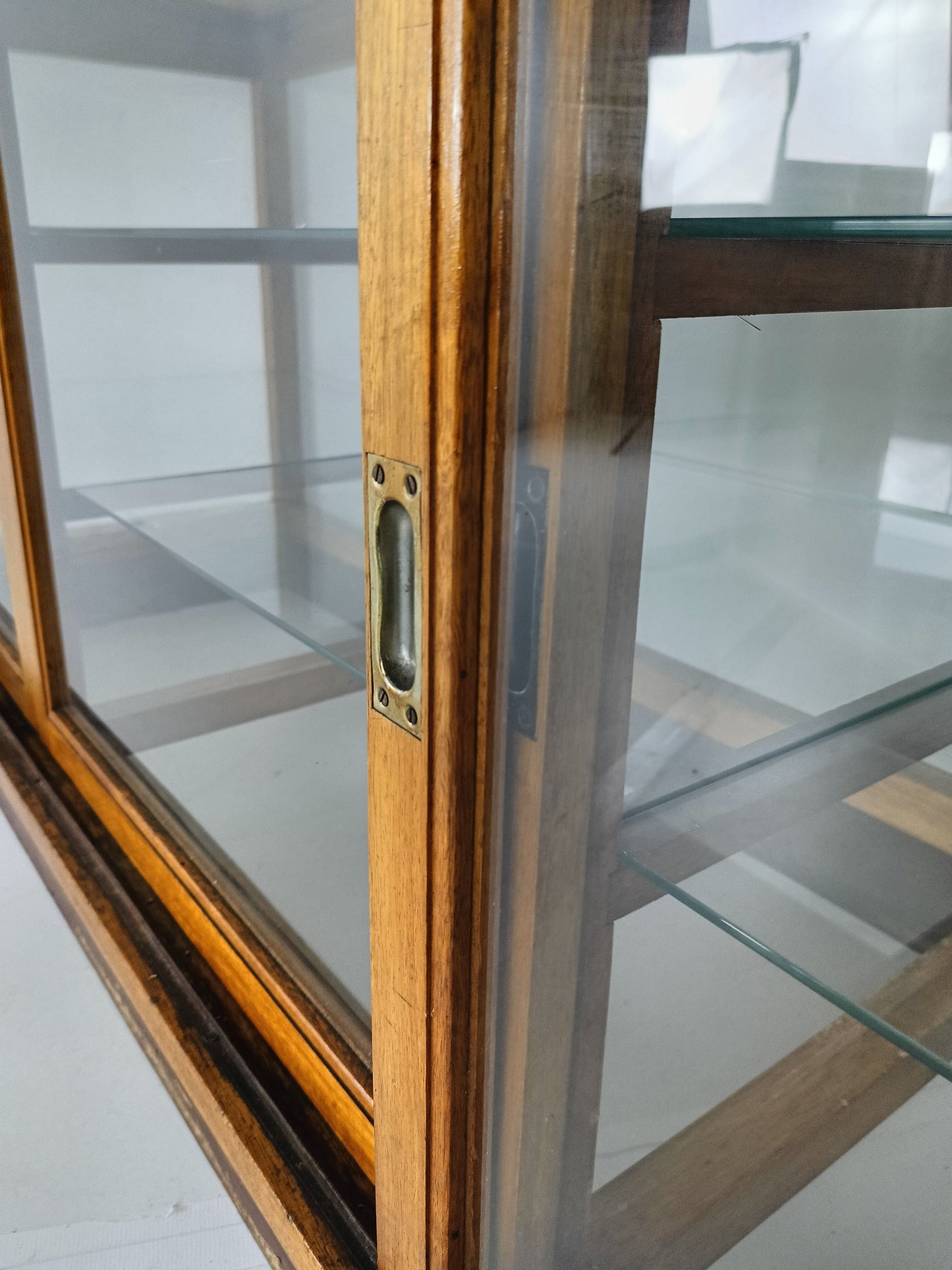 Elegant Antique Store Display With Glass Shelves Elegant Antique Store Display With Glass Shelves