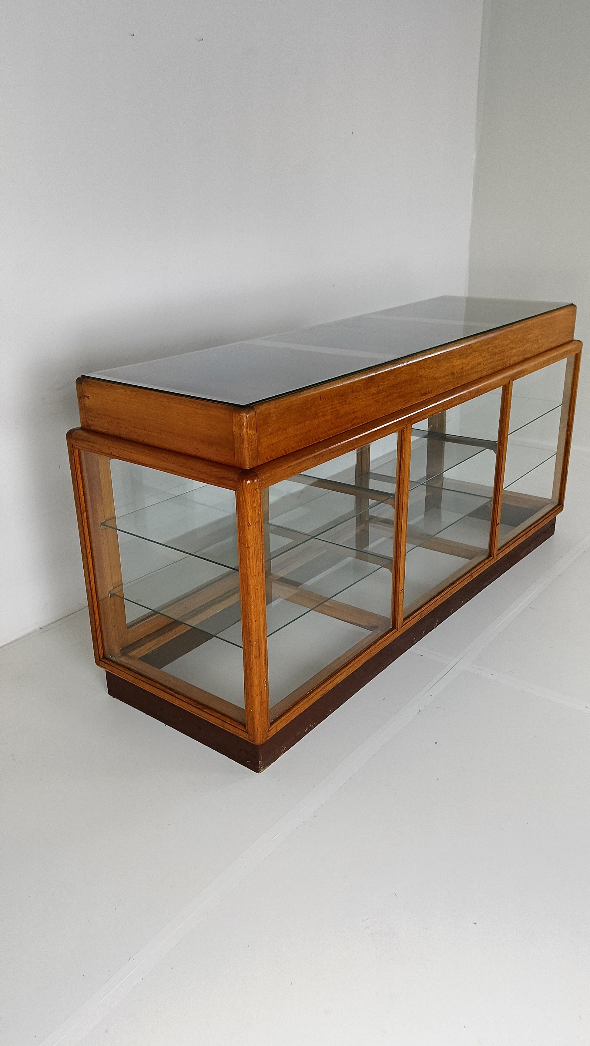 Elegant Antique Store Display With Glass Shelves Elegant Antique Store Display With Glass Shelves