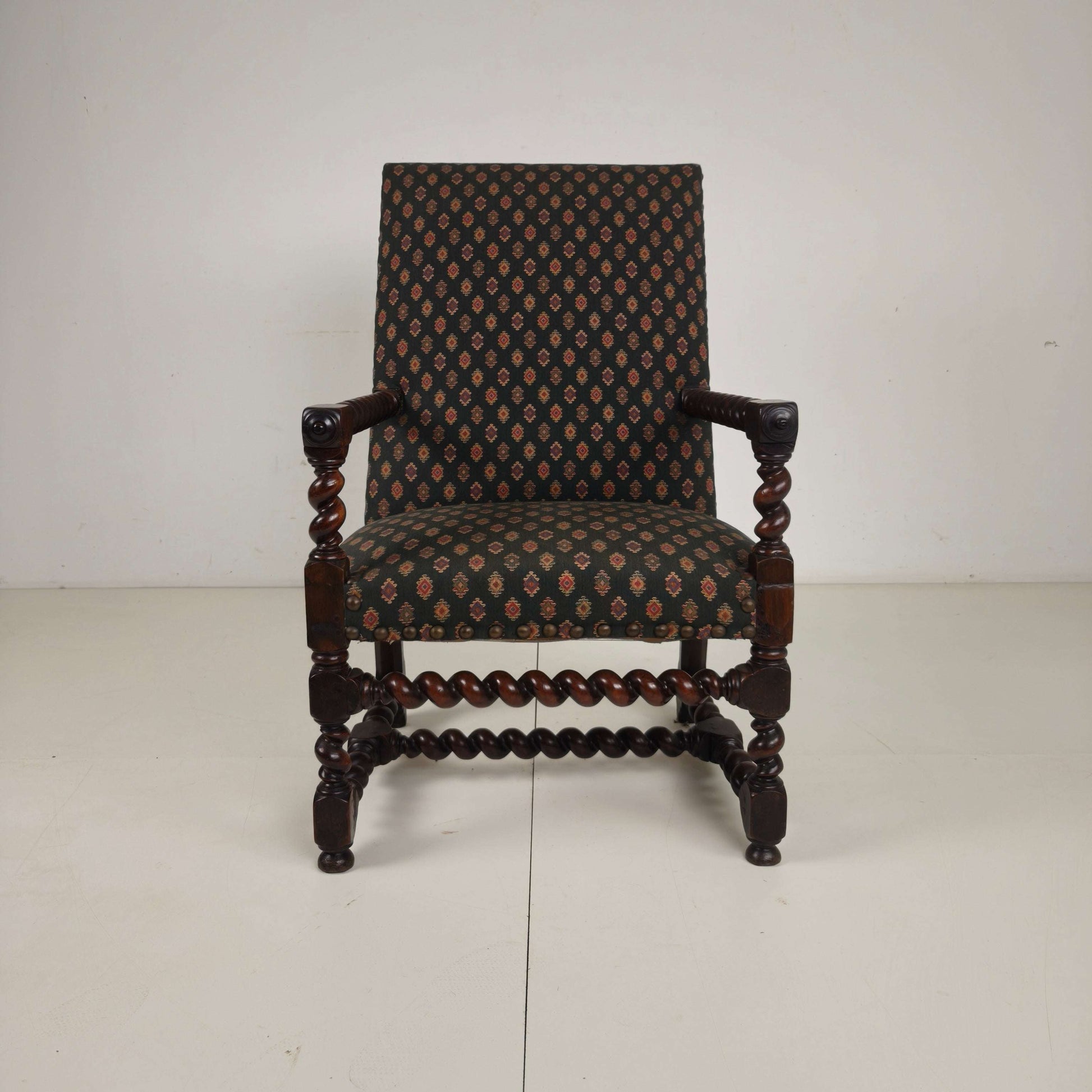 English Barley Twist Library Armchair in Dark Oak, circa 1700 English Barley Twist Library Armchair in Dark Oak, circa 1700