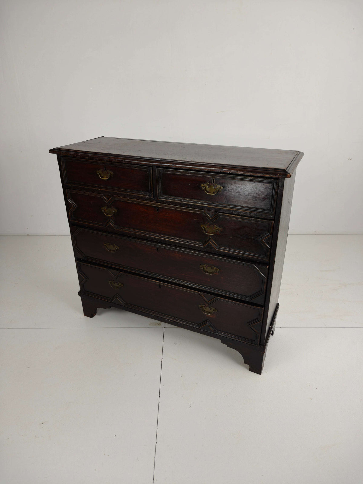 English Geometric-Panelled Oak Chest of Drawers, circa 1680 English Geometric-Panelled Oak Chest of Drawers, circa 1680
