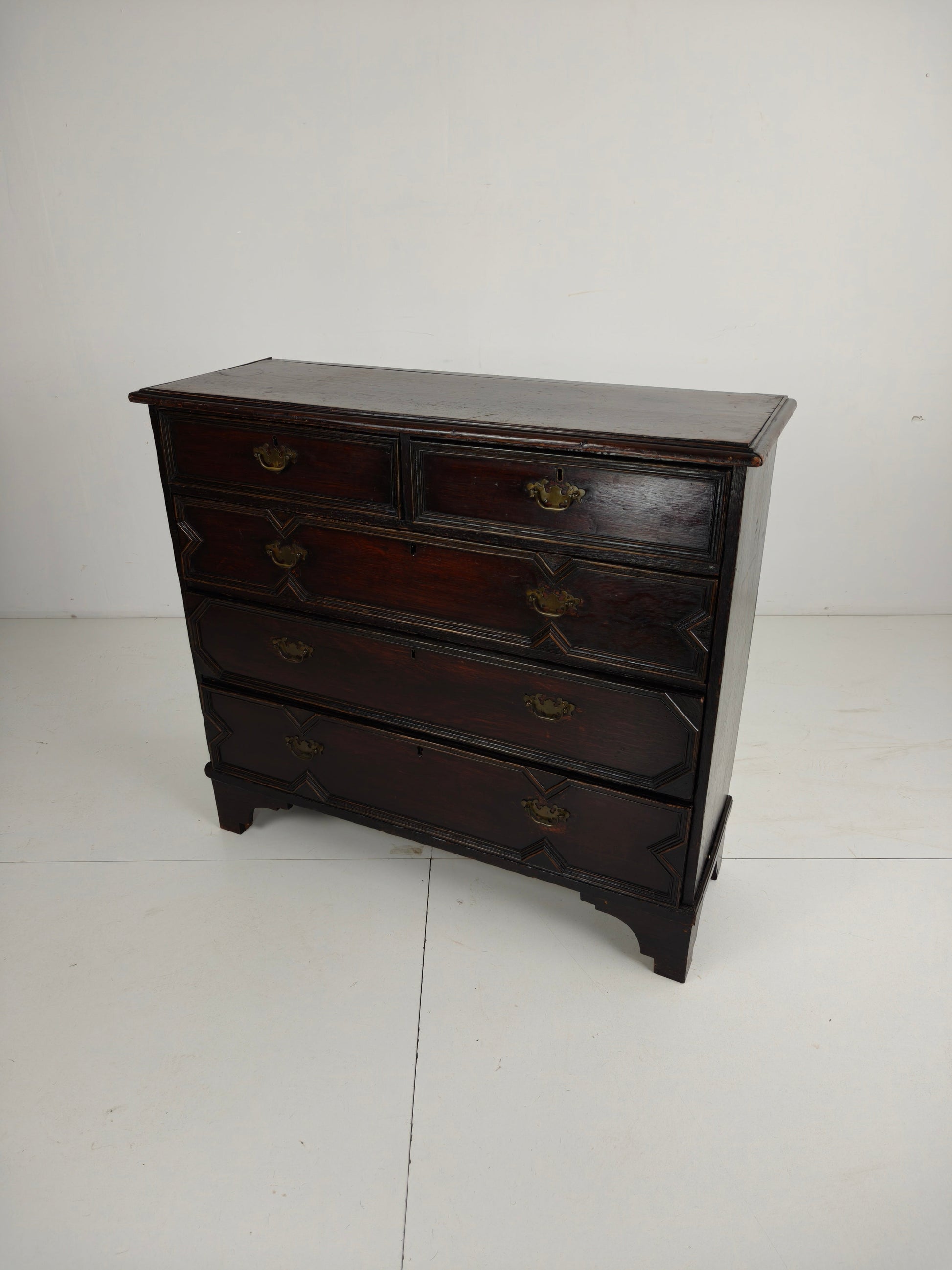 English Geometric-Panelled Oak Chest of Drawers, circa 1680 English Geometric-Panelled Oak Chest of Drawers, circa 1680