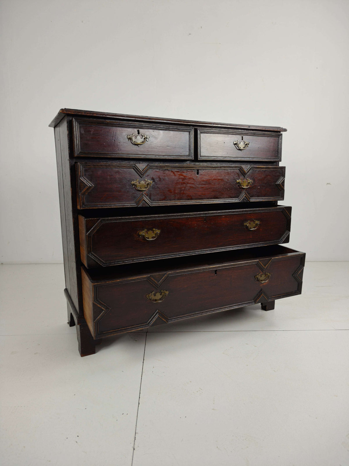 English Geometric-Panelled Oak Chest of Drawers, circa 1680 English Geometric-Panelled Oak Chest of Drawers, circa 1680