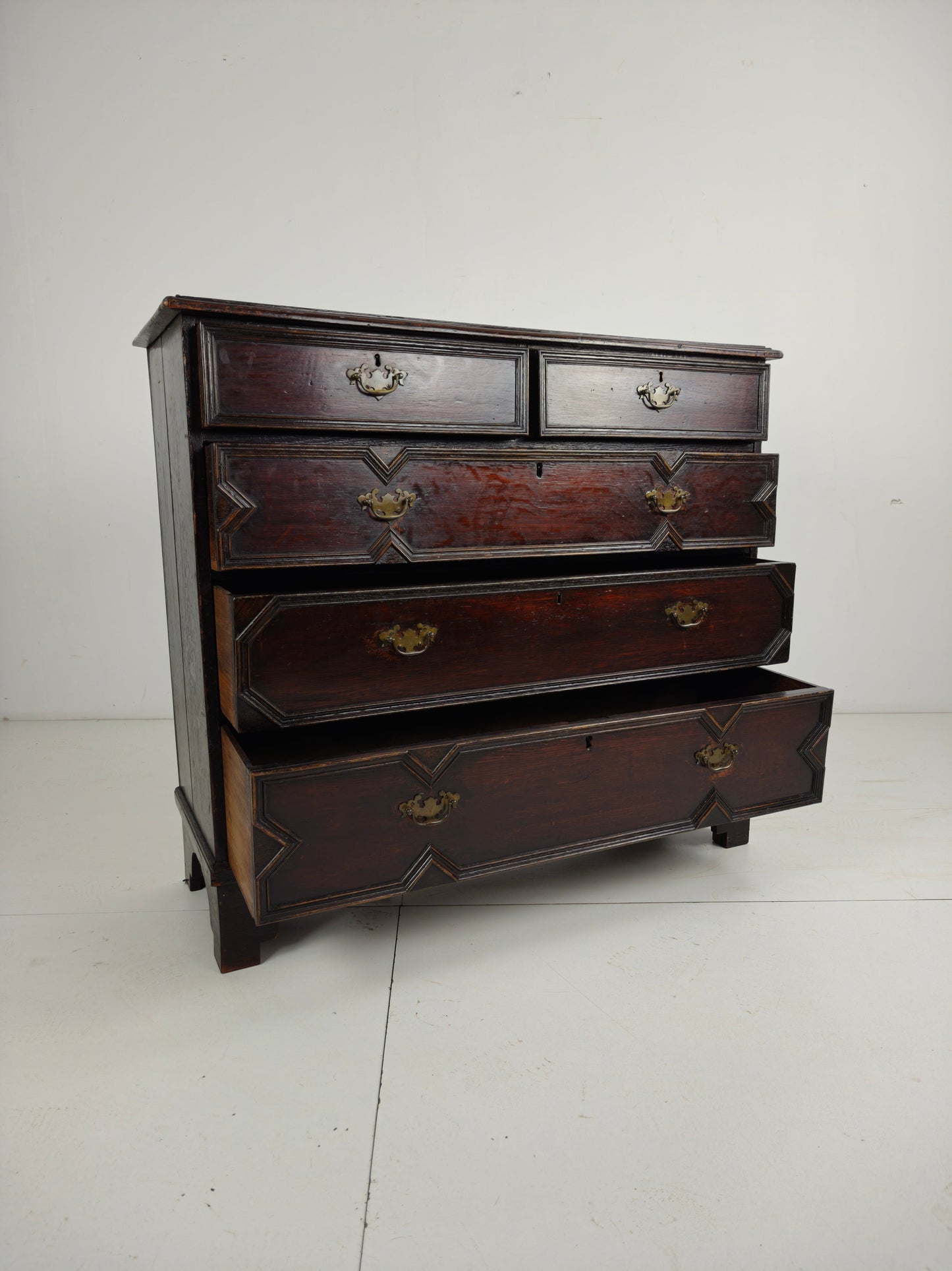 English Geometric-Panelled Oak Chest of Drawers, circa 1680 English Geometric-Panelled Oak Chest of Drawers, circa 1680
