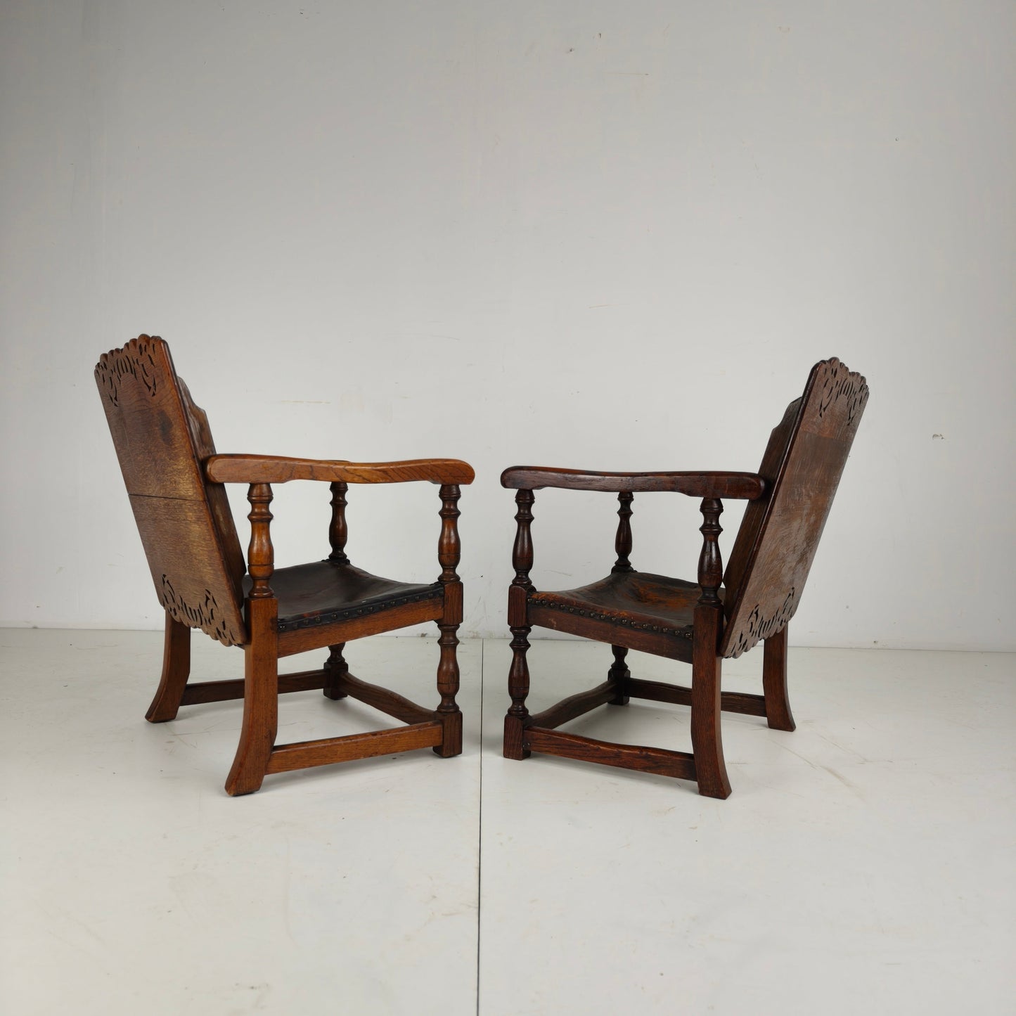 Pair of English Antique Jacobean Monk Armchairs / Tables by F. Parker & Sons Ltd Pair of English Antique Jacobean Monk Armchairs / Tables by F. Parker & Sons Ltd