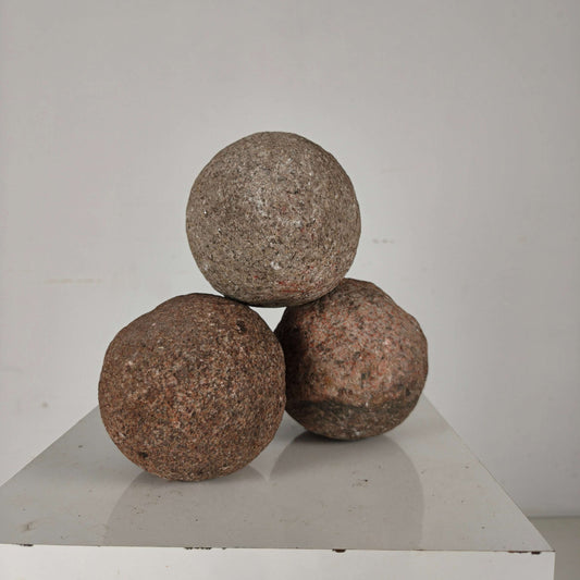 Set of three stone cannonballs – Northern Europe, 15th–16th century Netherlands Set of three stone cannonballs – Northern Europe, 15th–16th century Netherlands
